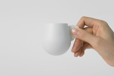 Espresso cup with a cloud shape handle