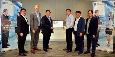 Globe Chief Technical Advisor Robert Tan (3rd from right) receives the Payment Card Industry Data Security Standard compliance certification version 3.2 for Globe Business from a representative of US-based Qualified Security Assessor Crimson Security, Inc. Other Globe officials who witnessed the awarding are (from L-R): Enterprise Sales Vice President Dion Asencio, Globe Business Senior Advisor Mike Frausing, Customer Systems Director Harry Florendo, and Info Security Governance Manager Paul Dumindin.