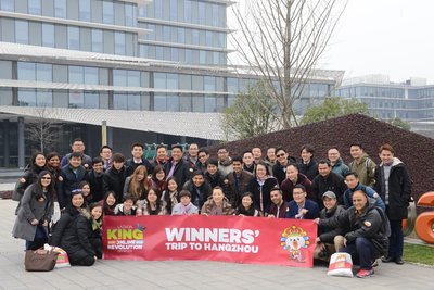 Top performing sellers across all Lazada markets pose in front of Alibaba's Hangzhou Campus
