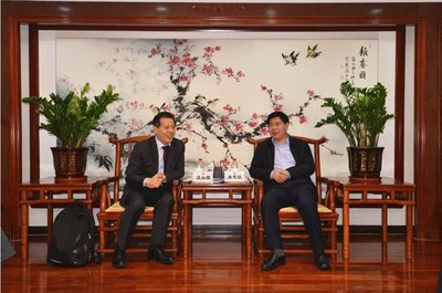 TUV莱茵大中华区总裁兼首席执行官汪如顺（左）与广东CIQ局长詹思明（右）会面