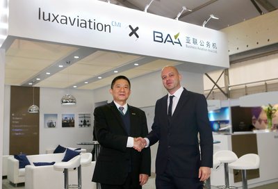 Mr. Zhu Yimin, President of CMIG Aviation and Mr. Tom Künsch, Managing Director of Luxaviation Asia