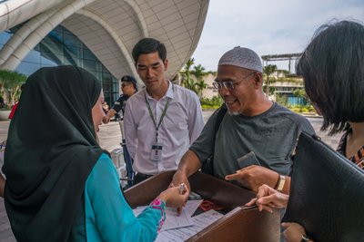 The first group of homeowners from around the world take possession of their new residences in Forest City