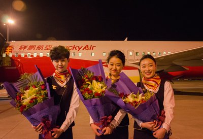cabin crew of the maiden trip from Kunming to Manila
