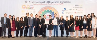 Hang Lung Properties' Head of Human Resources, Ms. Janet Poon (10th from the right), receives the awards at the presentation ceremony of the International Customer Relationship Excellence Awards 2016 with her team members.