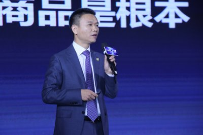 Jason Kong, the chairman of GHS, is delivering a speech.