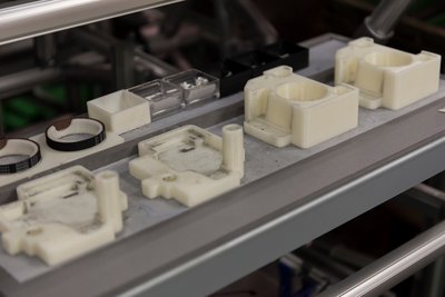 Ricoh’s 3D printed jigs and fixtures boost assembly line productivity, produced on the Stratasys Fortus 900mc Production 3D Printer using ABS plastic