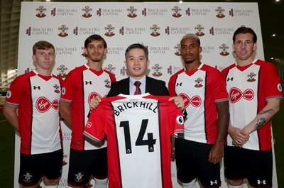 Brickhill Capital Limited (BHC) CEO, Guoxian Chen with Southampton Football Club players at the partnership launch today