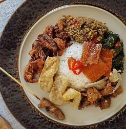 Satisfy your taste buds with Nasi Campur Bali, a local favourite