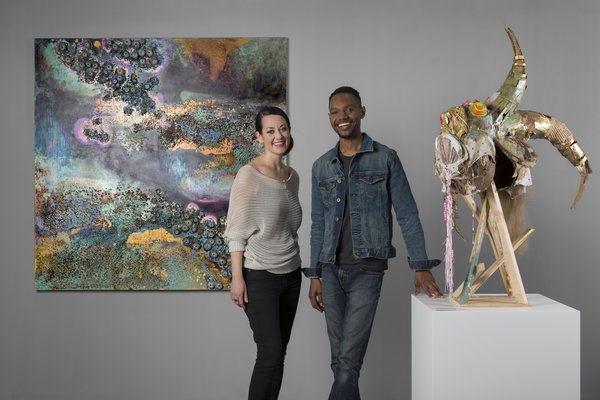 SCAD Alumni Monica Cook and Lavar Munroe with their works on the SCAD Booth, F20, at Art Central 2018. Image Courtesy of SCAD