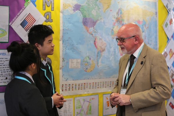 Principal Brian Cooklin chats with students at Nord Anglia International School, Hong Kong. As part of the School’s educational offer, students are encouraged to be mindful and supportive of their community.