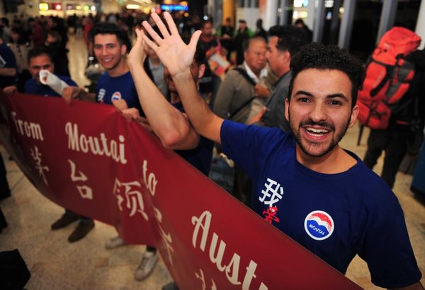 Moutai fans welcome the visiting group to Australia at Sydney Airport