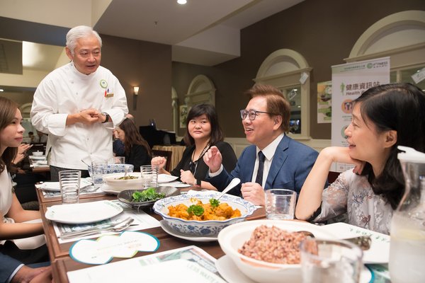 Sands China Ltd. President Dr. Wilfred Wong addresses team members dining at The Venetian Macao’s back-of-house team member dining room during Green Mondays - part of the company’s new myFITNESS initiative aimed at encouraging good habits for team members’ health, physical fitness and well-being