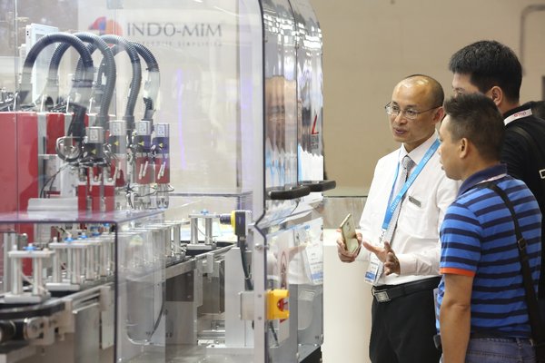 Visitors viewing automation equipment at Medtec China 2018