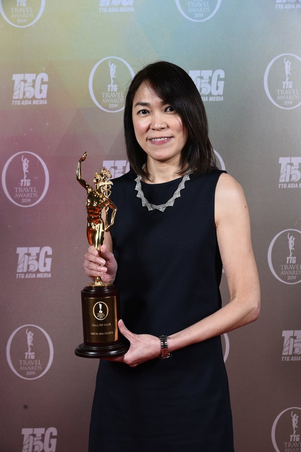 Brigette Tan, Senior Manager - Loyalty & Partnership Marketing, Hertz Asia Pacific, collects the Hall of Fame for Best Car Rental award at TTG Asia Travel Awards on behalf of Hertz.