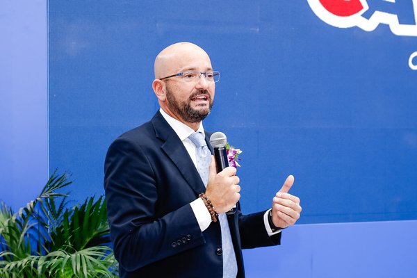 CARIOCA CEO Enrico Toledo delivers a speech