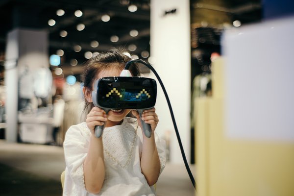 Girl using VR device