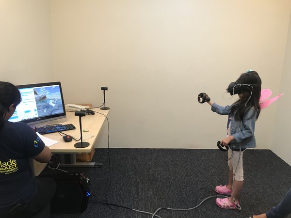 A kid receiving VR therapy through the Vivid Vision at VISTA