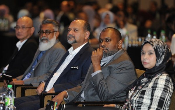 The Honourable Minister seated with leaders from CCAM